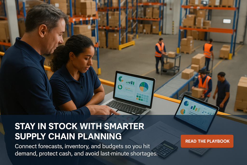 Planners review supply chain charts on a laptop and tablet above a warehouse while workers move cartons on a conveyor.