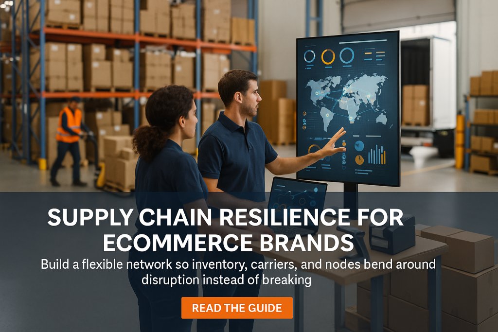 Two planners review a global supply chain map on a screen while a worker moves pallets near the dock in a warehouse.